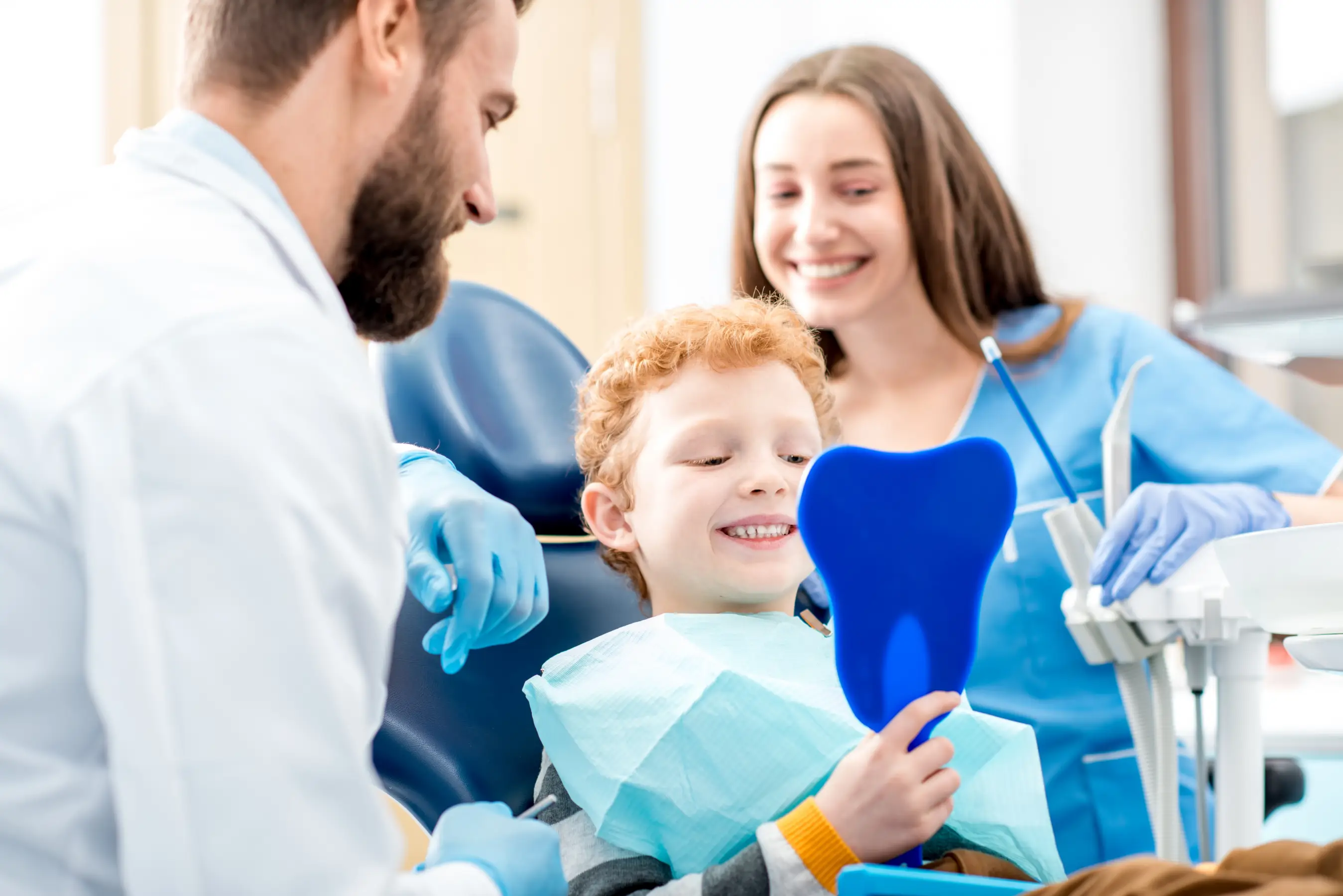 A fluoride treatment during a child's dental visit